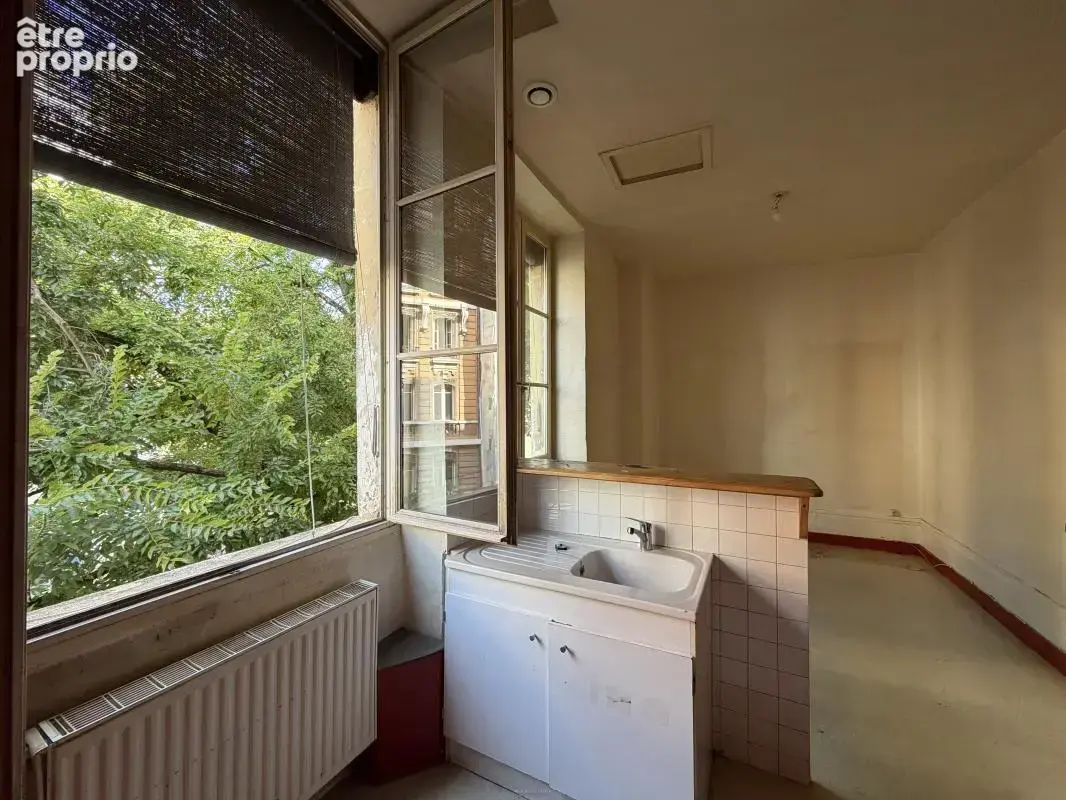 Rue Sergent Blandan - T4 de 92m² - photo 3