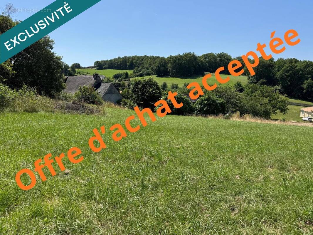 Photo 1 - Terrain à TERRASSON-LAVILLEDIEU