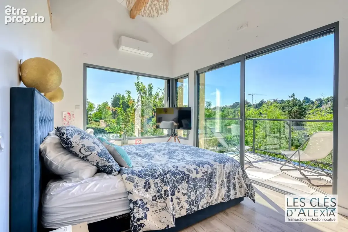Saint-didier-au-mont-d’or — somptueuse maison contemporaine avec piscine  203 m²  terrain 2 134 m² - photo 10