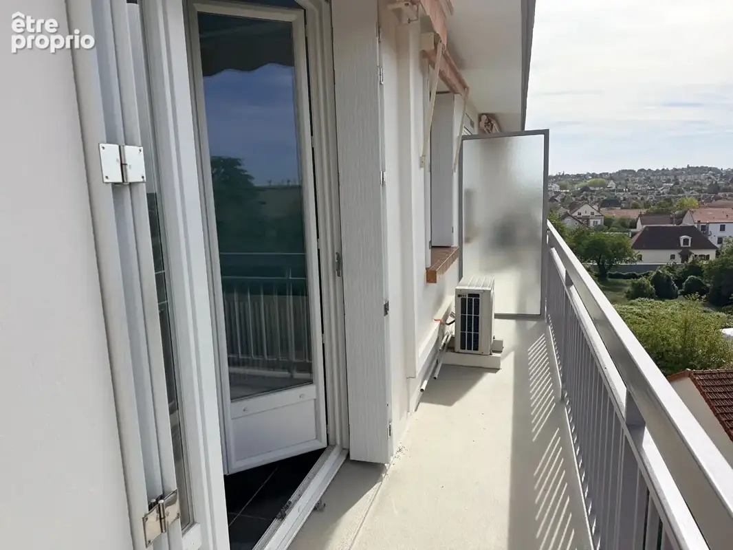 Appartement T4 de 71 m² hab au 5ème et dernier étage avec asc, garage et balcon - photo 3