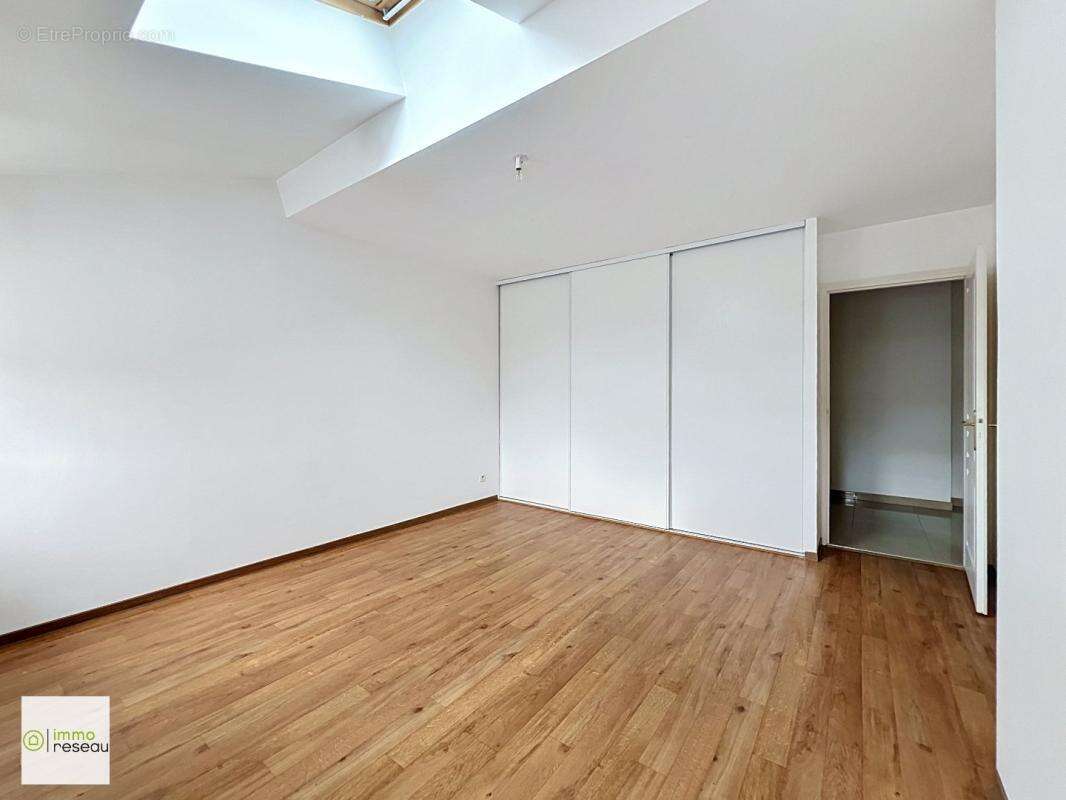 Appartement en résidence - photo 8