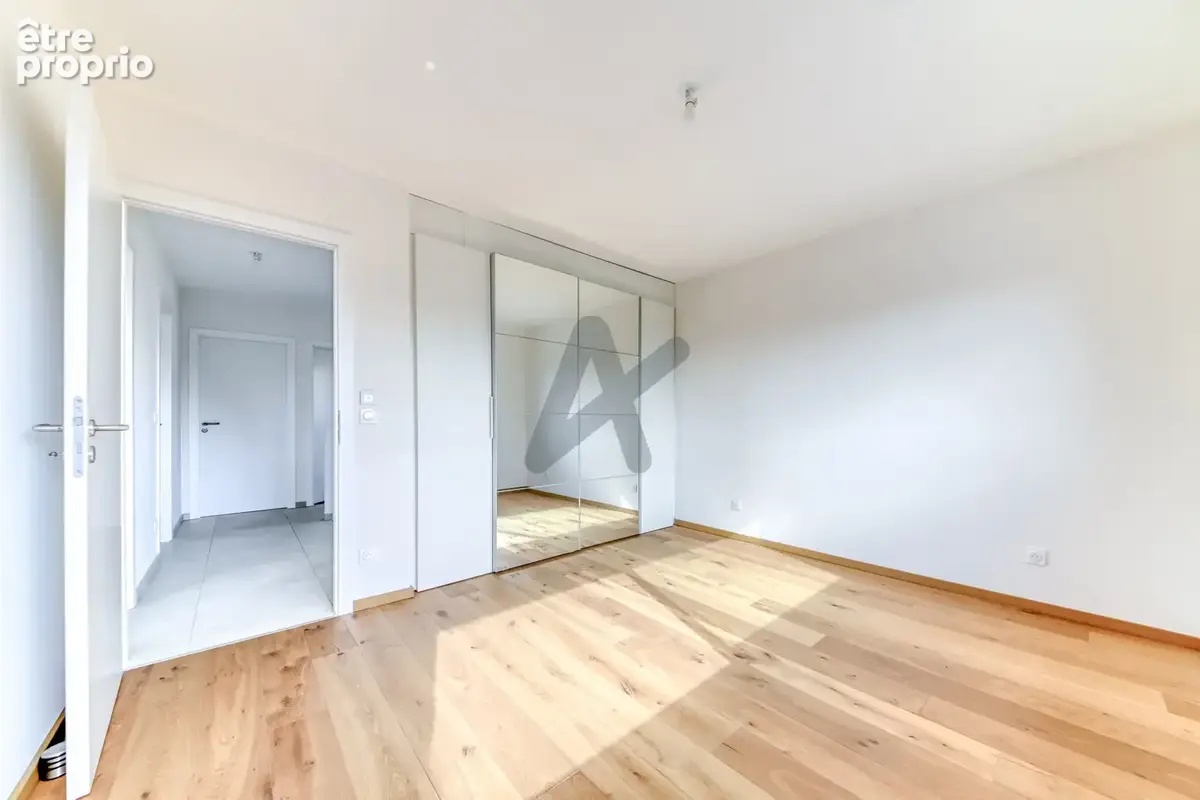 Ecully - Les Serres: Une maison contemporaine de 189m2, 5 chambres, terrasse, jardin, piscine et garage. - photo 13