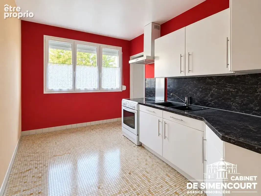 Appartement T4  - balcon, cave et 3 chambres - photo 2