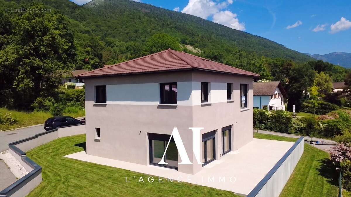 Maison 169 m² à Echenevex  - photo 2