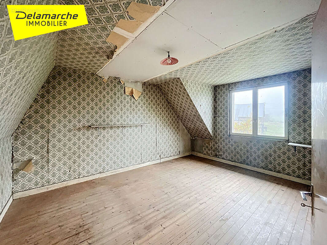 Maison à SAINT-GEORGES-DE-LIVOYE