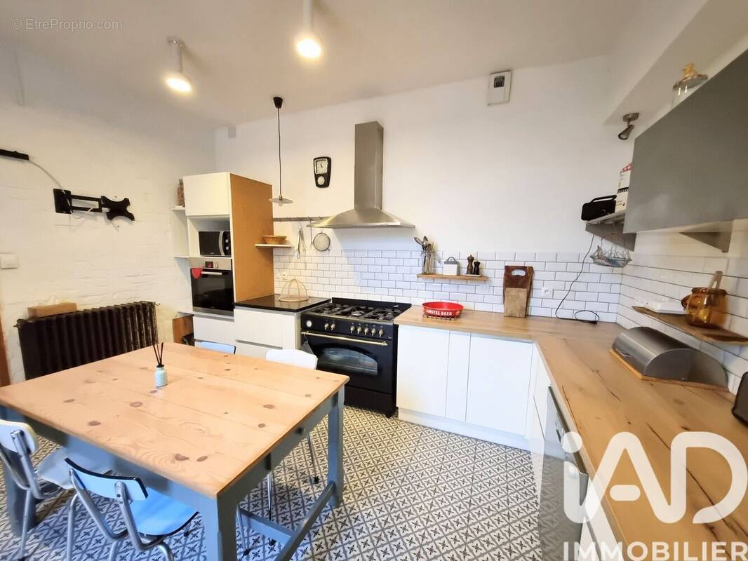 Photo 1 - Maison à SAINT-JULIEN-LES-ROSIERS