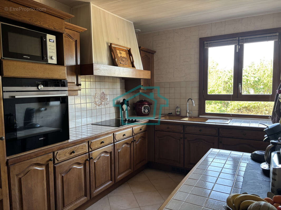 RARE SUR LE SECTEUR - Maison de plain-pied - 4 chambres sur 1 000 m2 de terrain - Entre Thoiry et Septeuil - photo 7