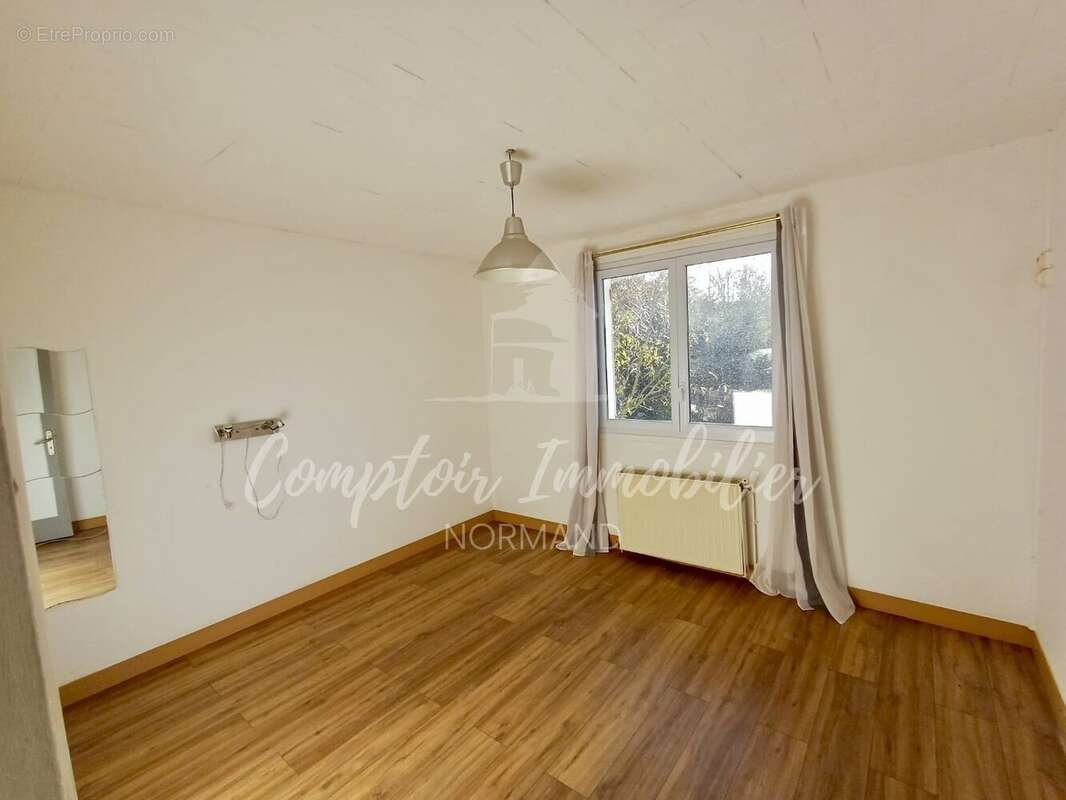 Maison à THIL-MANNEVILLE