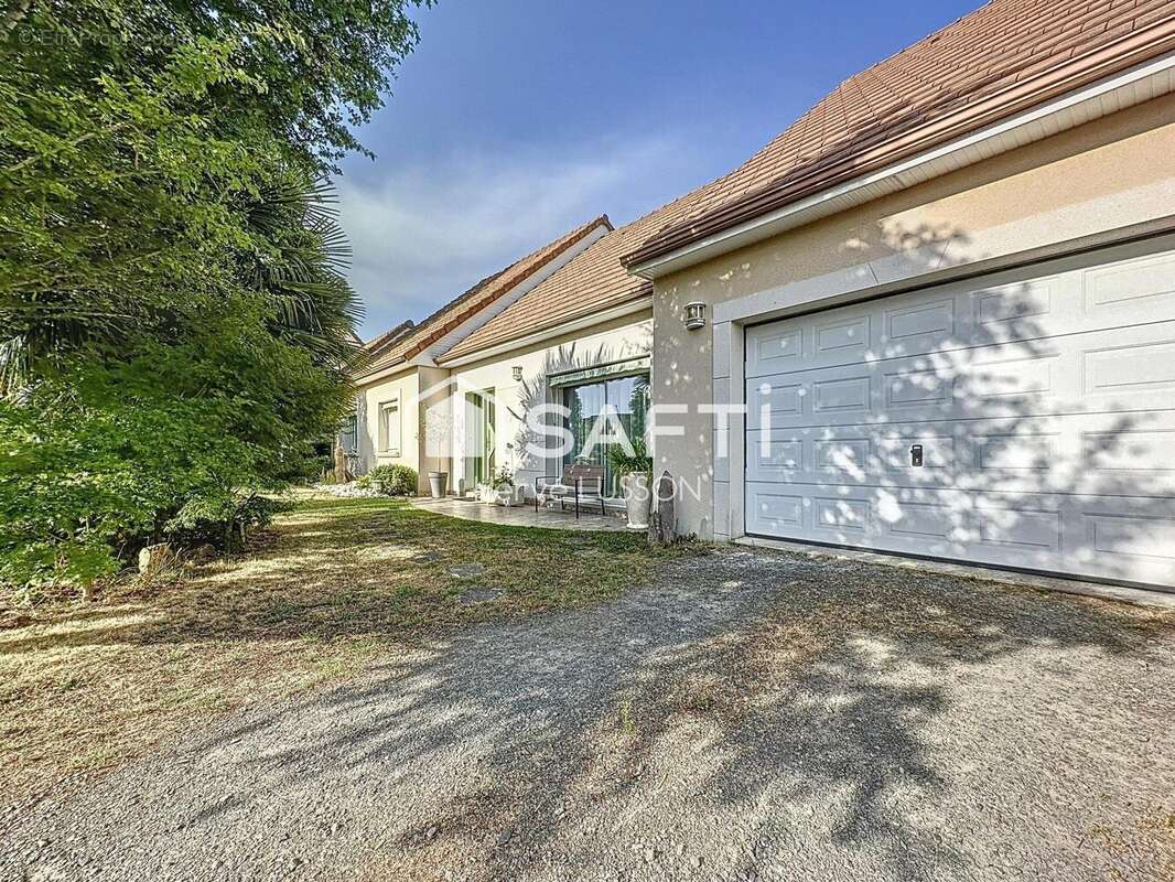 Photo 2 - Maison à LAIGNE-EN-BELIN