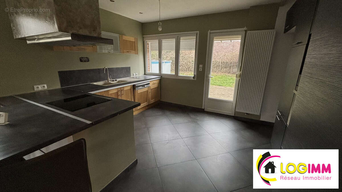 Maison 117 m² à Villers-Pol  - photo 6