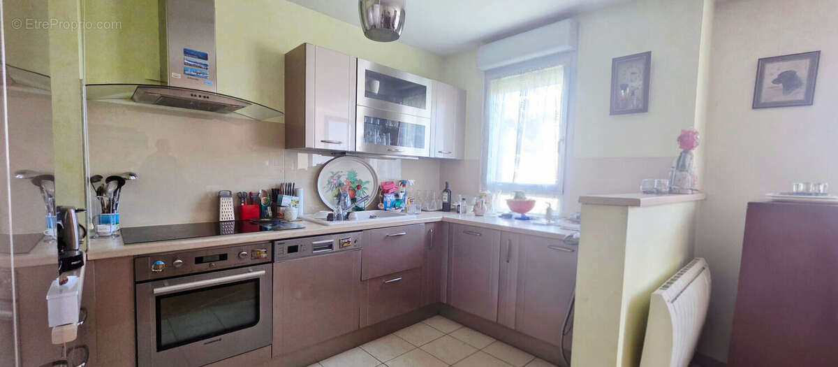 Appartement 5 pièces à vendre à Étampes dans une résidence sécurisée avec ascenseur et place de stationnement couverte, idéaleme - photo 3