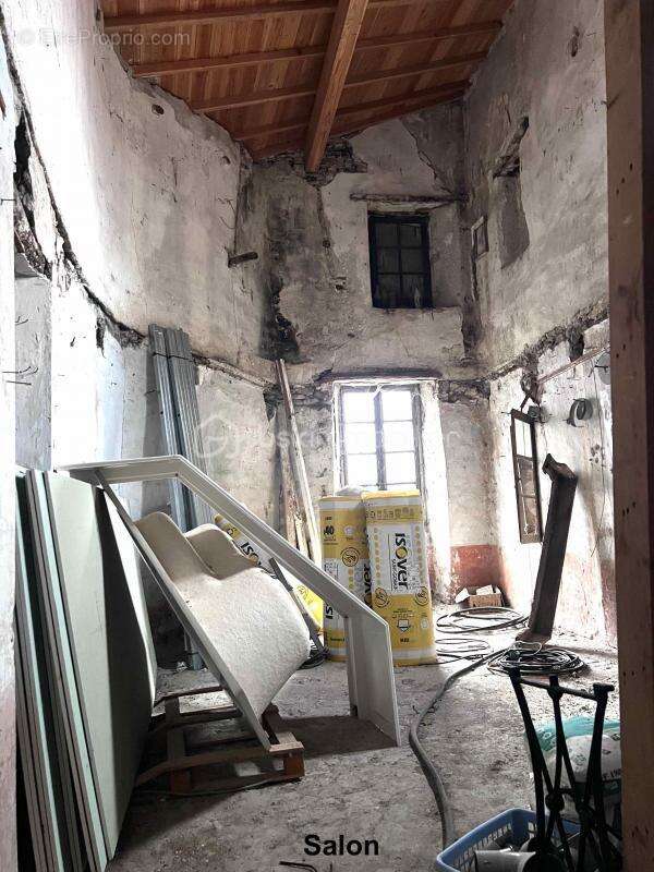 Maison en pierre R+1 de 144 m2 habitable avec combles de 63 m2 et cave voutée en sous sol de 88 m2 - photo 9