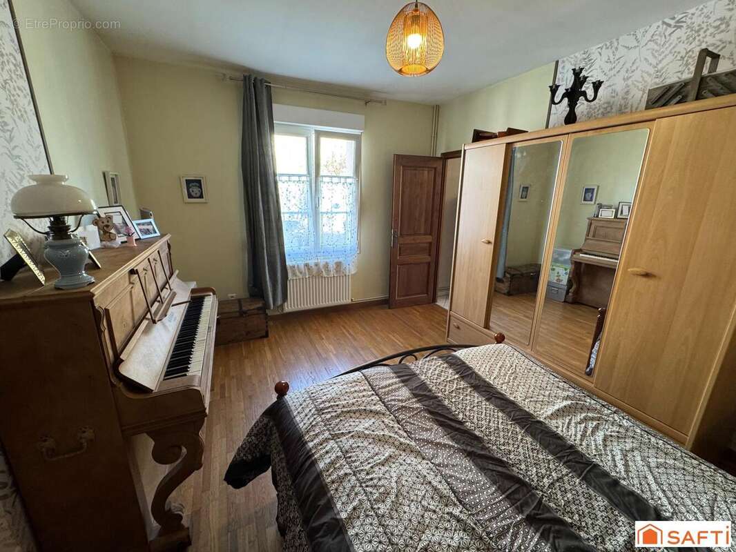 Photo 8 - Maison à ROMAGNE-SOUS-MONTFAUCON