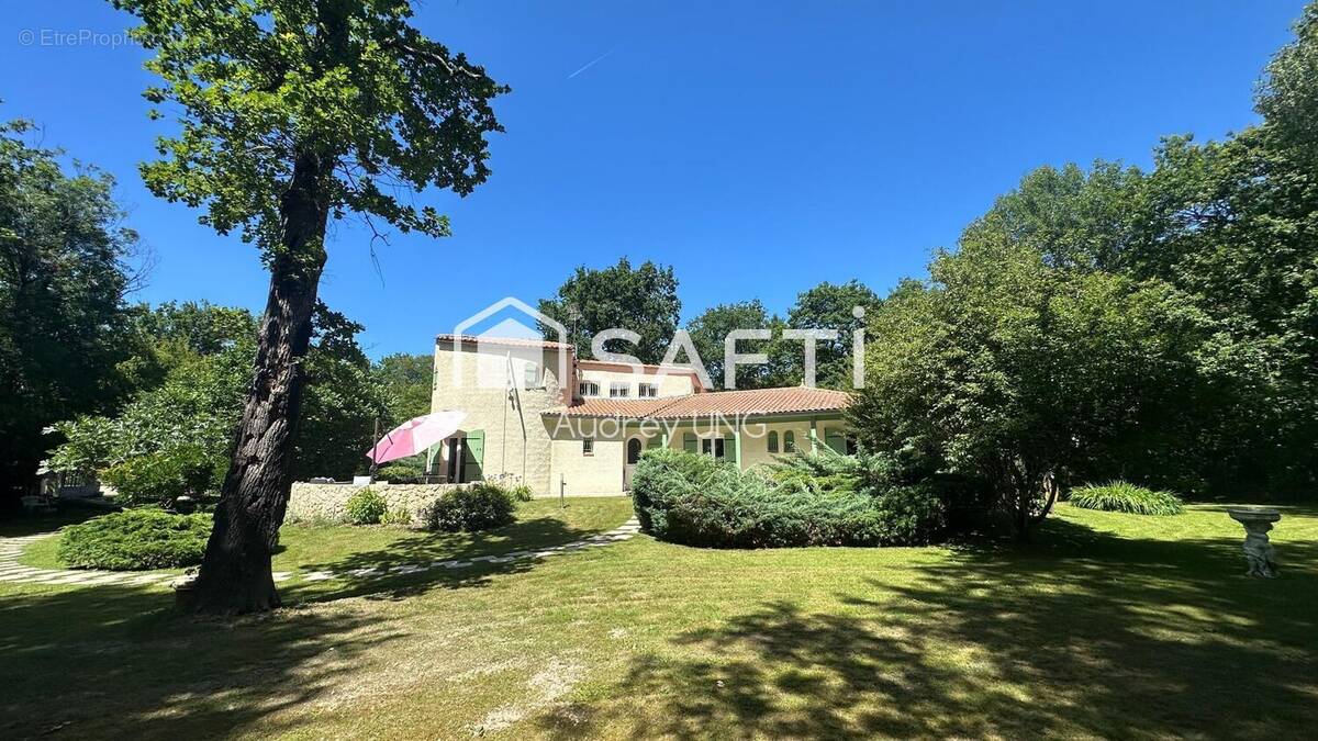 Photo 1 - Maison à FARGUES-SAINT-HILAIRE