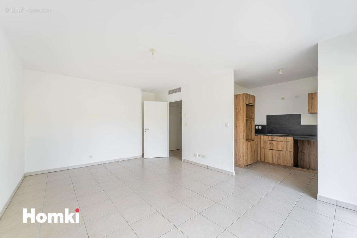Appartement T2 de 46 m2 avec box - photo 4