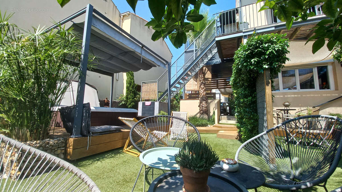 Appartement + jardin + parking, rez-de-jardin quartier Bassin/Champ de Mars. - photo 2