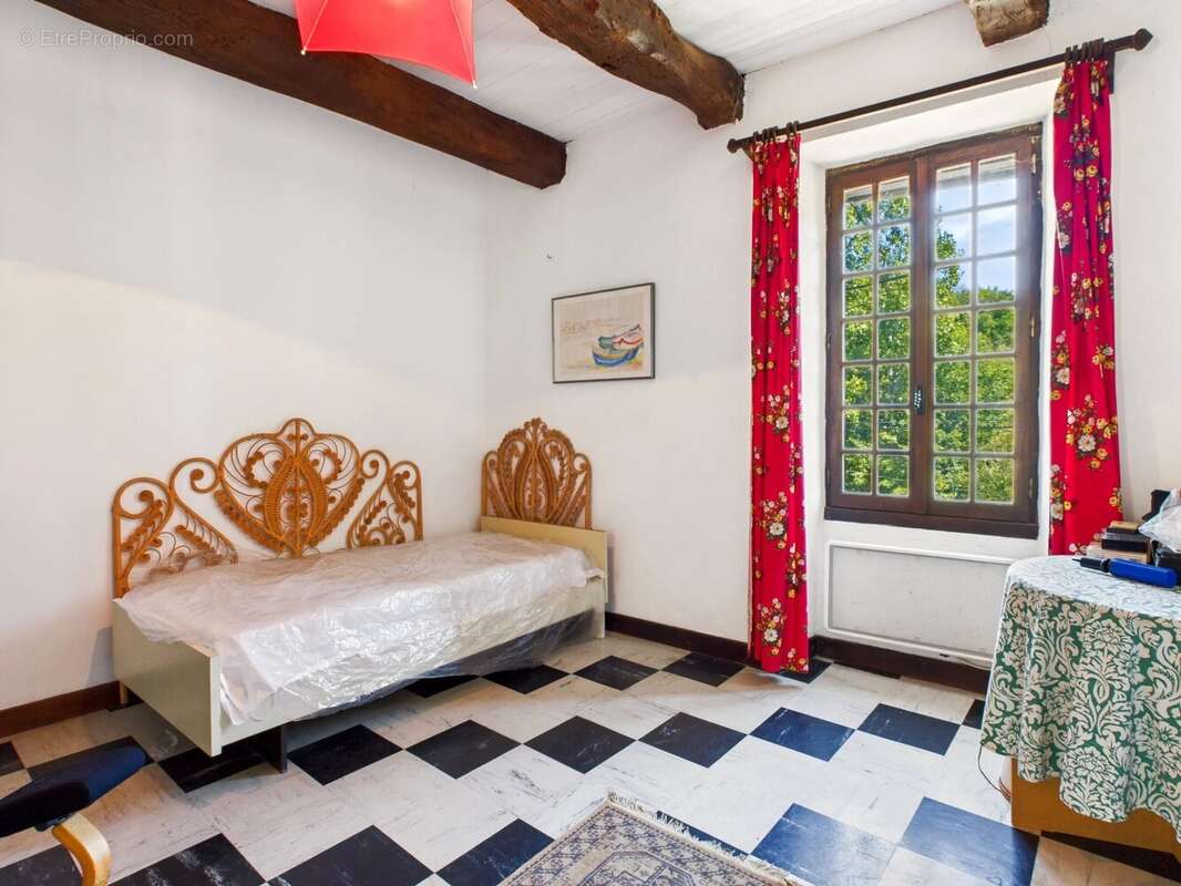 Maison à MIRANDOL-BOURGNOUNAC