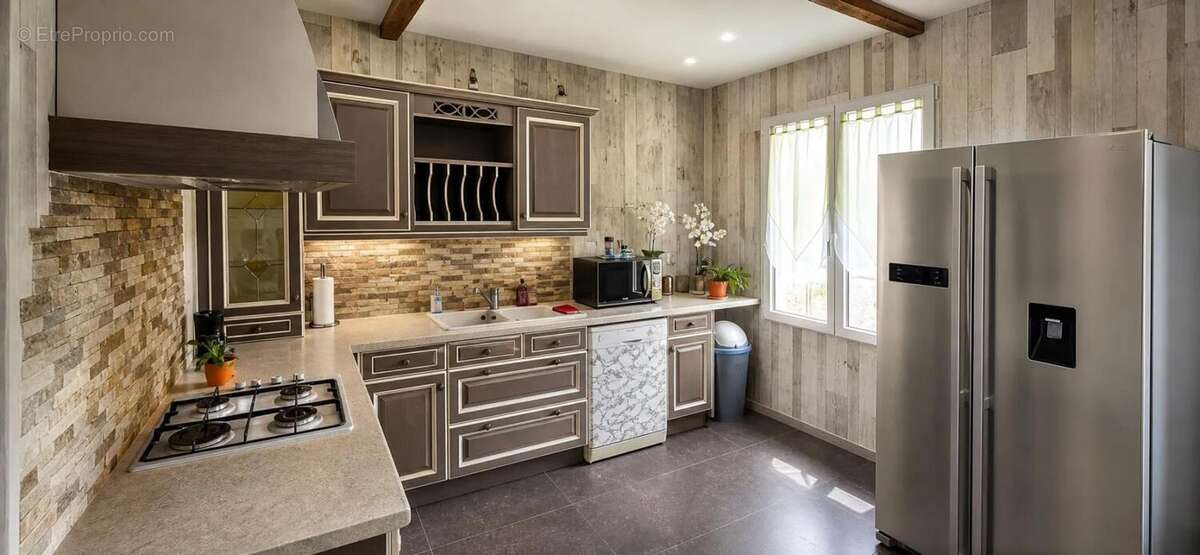 Maison de plain-pied 5 pièces de 85 m² à Saint-Pierre-en-Auge - photo 2