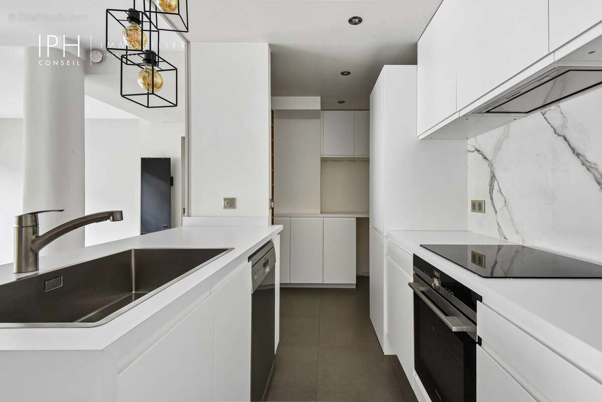 Appartement rénové, lumineux et proche commodités - photo 9