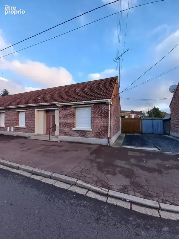Maison à COURRIERES