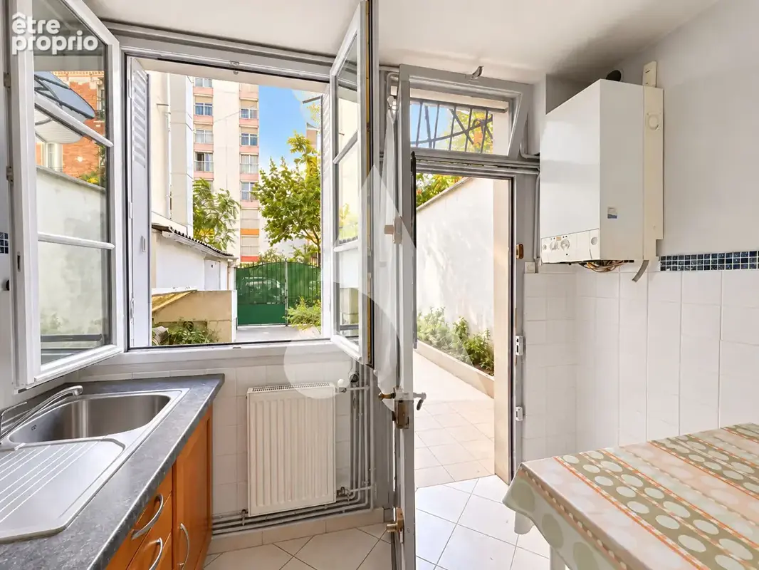Appartement St Ouen 3 pièce(s) 62 m2 - photo 4