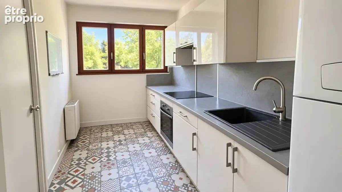 Appartement T3 de 64m² avec cave - LA TOUR D'AYGOSI - photo 3