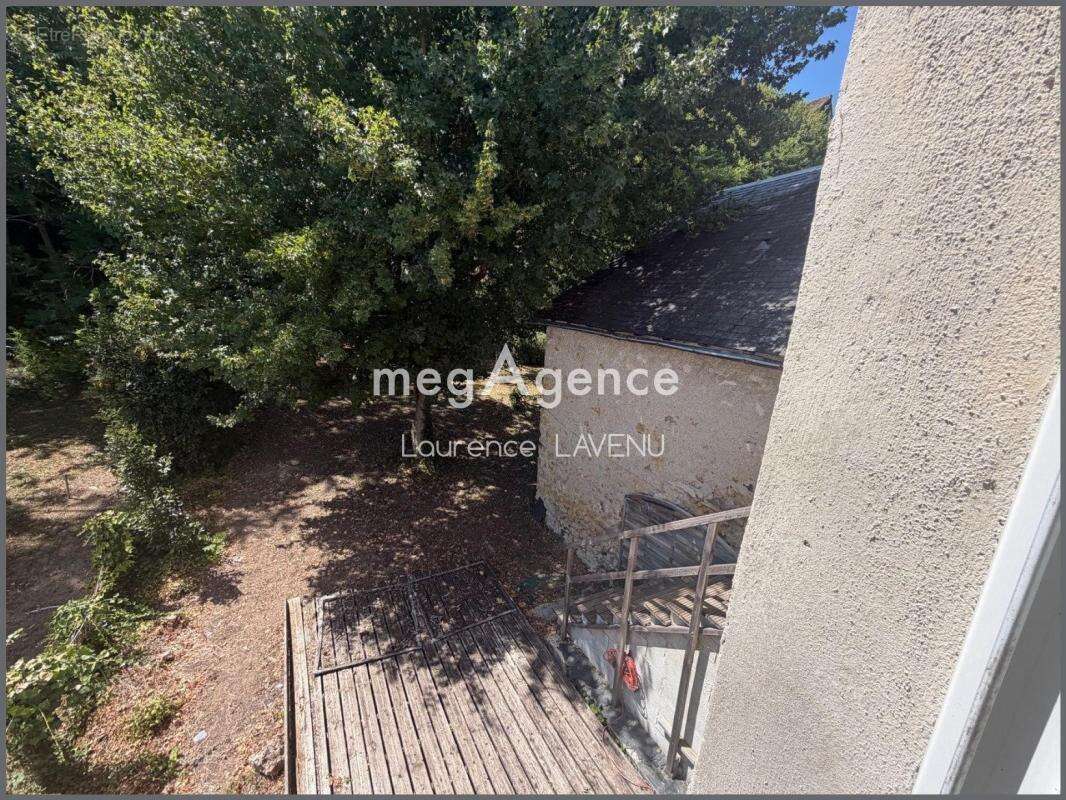 Maison familiale en centre ville avec jardin - photo 11