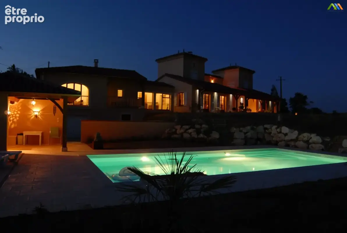 Evening pool terrace at contemporary home near Marciac