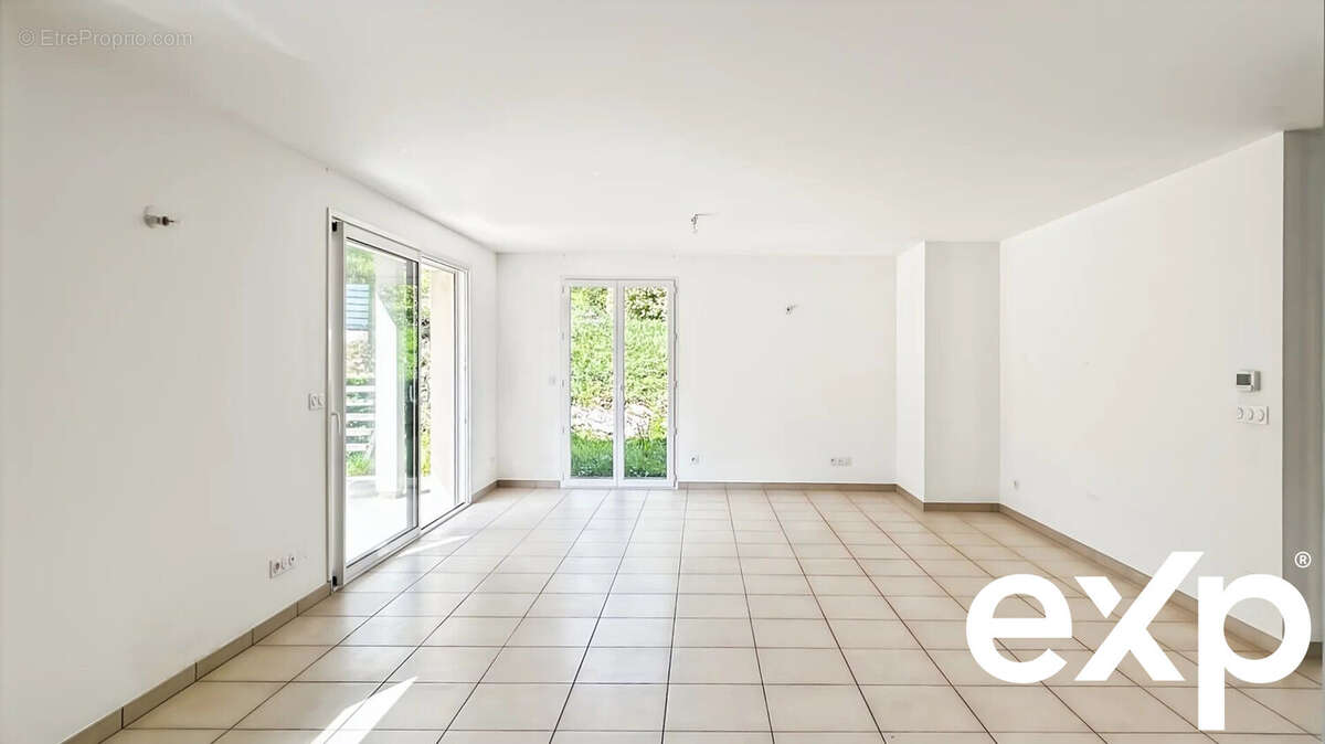 Maison à POUILLEY-LES-VIGNES