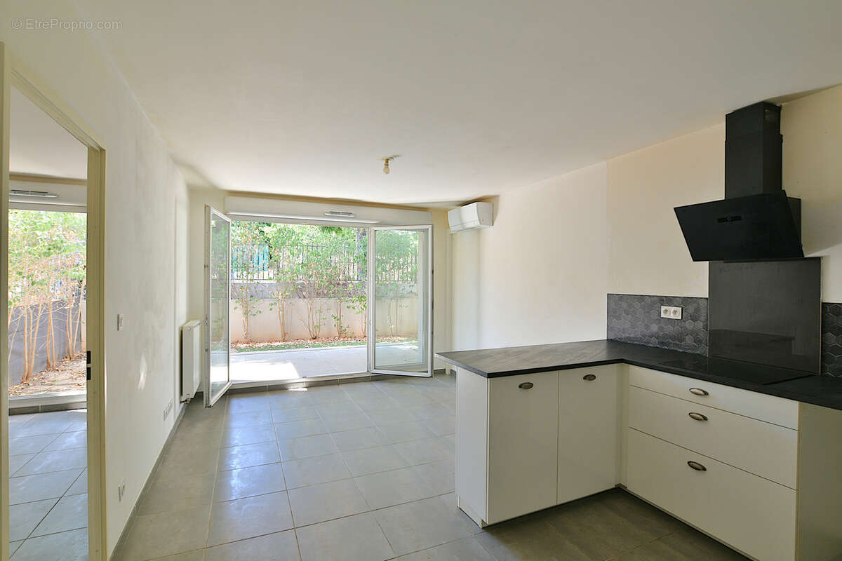 T2 rez de jardin toulon est - photo 2