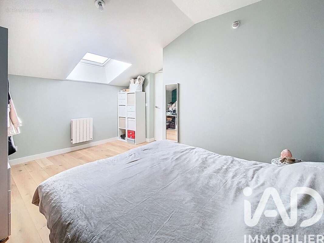 Photo 8 - Appartement à VOISINS-LE-BRETONNEUX