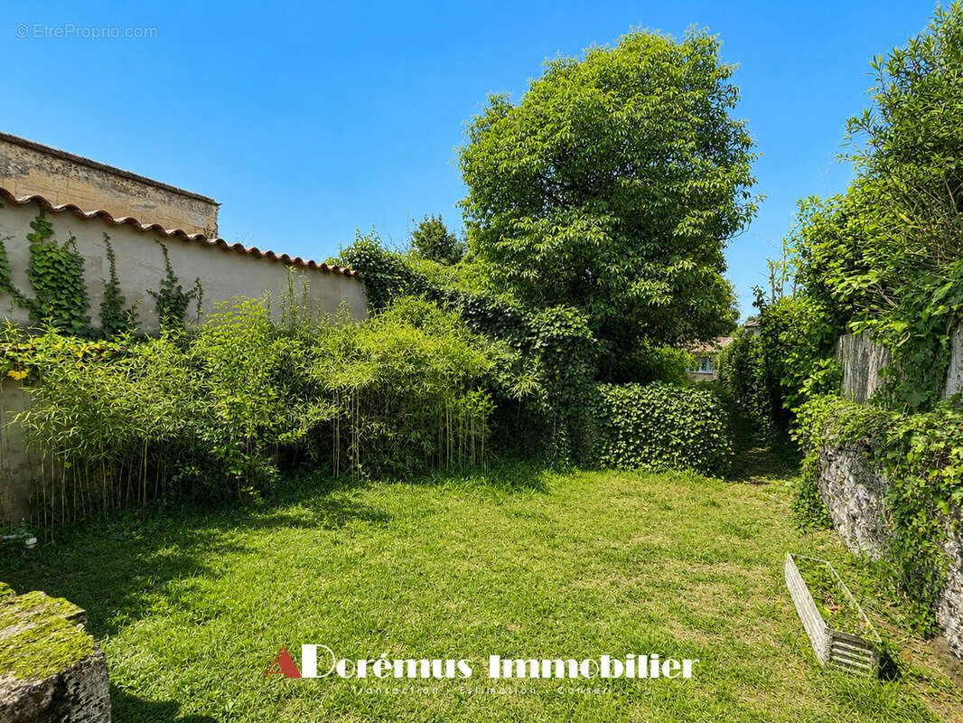 Maison de village de 202 m2 avec jardin et fort potentiel d’aménagement - photo 4