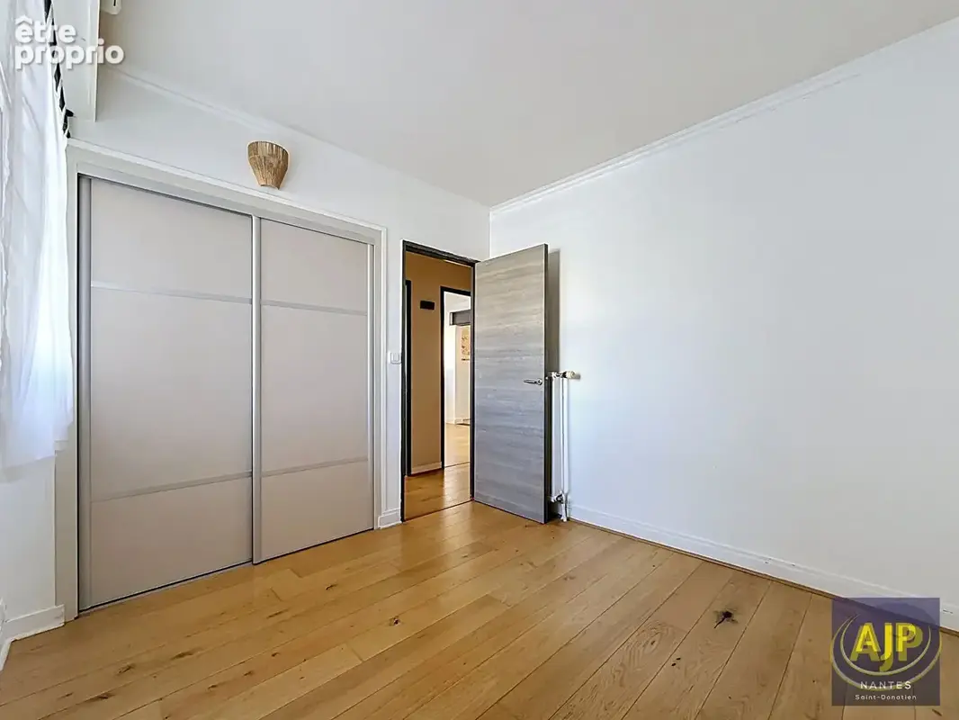 AJP IMMOBILIER NANTES - T3/T4 lumineux de 70 m² - Quartier Cité des Congrès / CHU - photo 6