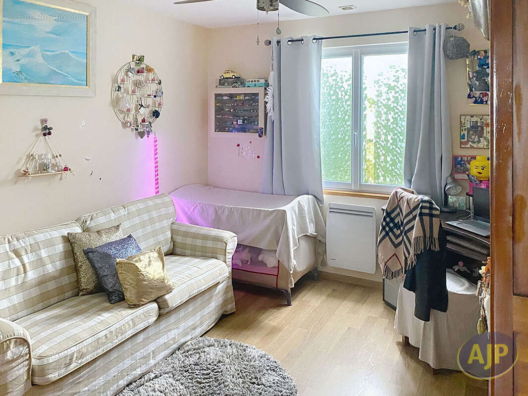 Maison fonctionnelle avec sous-sol aménagé et vue imprenable - photo 9