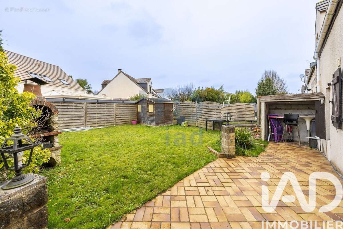 Photo 2 - Maison à LIEUSAINT