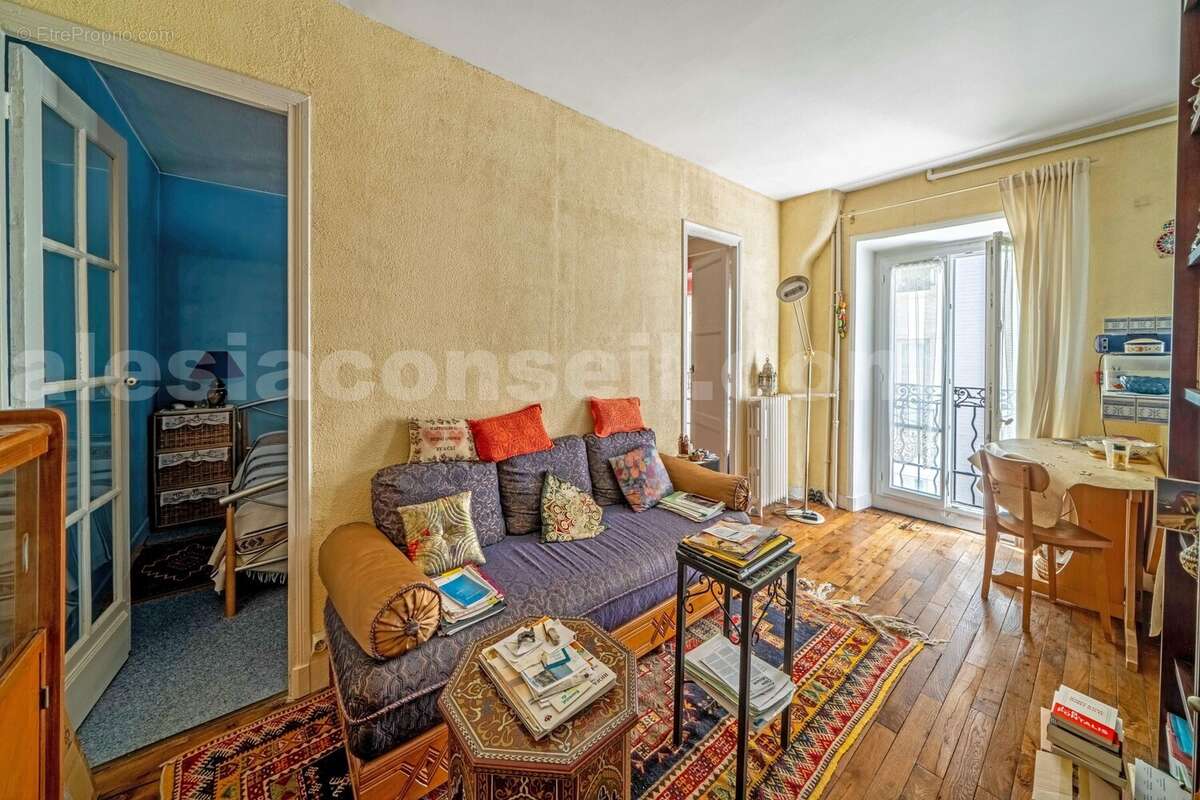 Photo n°1 - Appartement à PARIS-14E