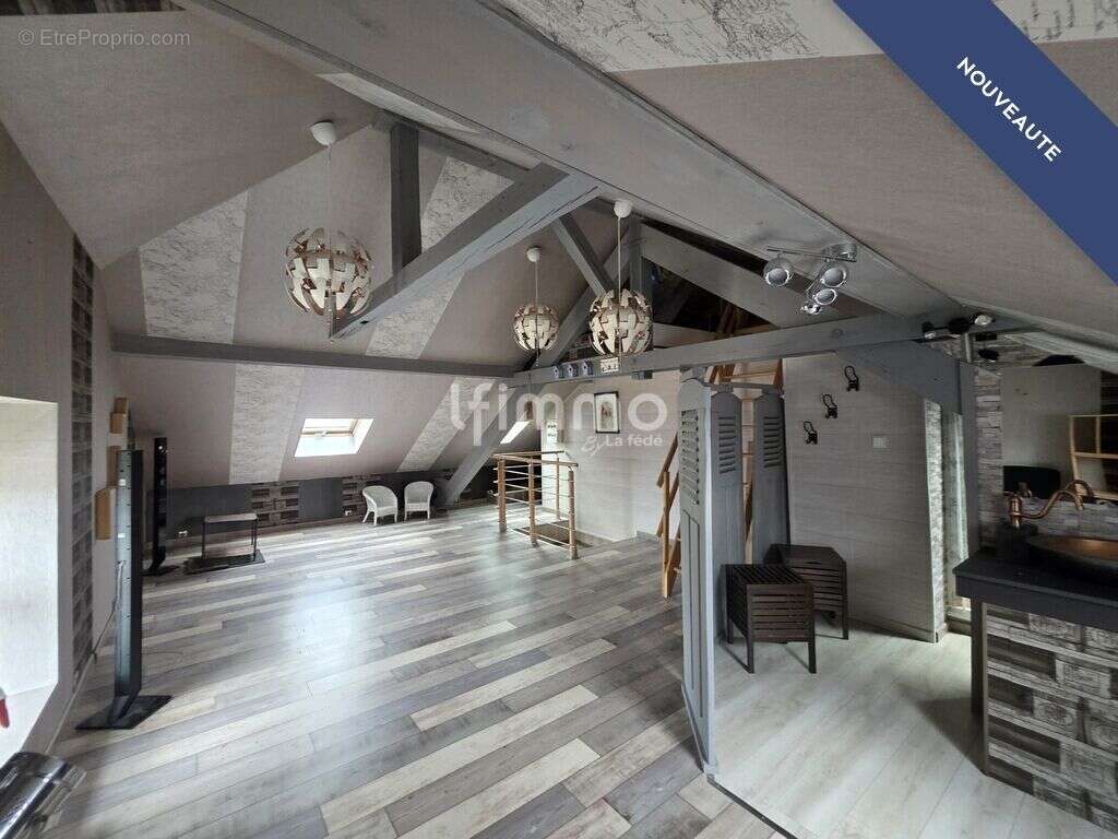 Duplex atypique de 158 m² avec jardin et 2 garages - photo 8