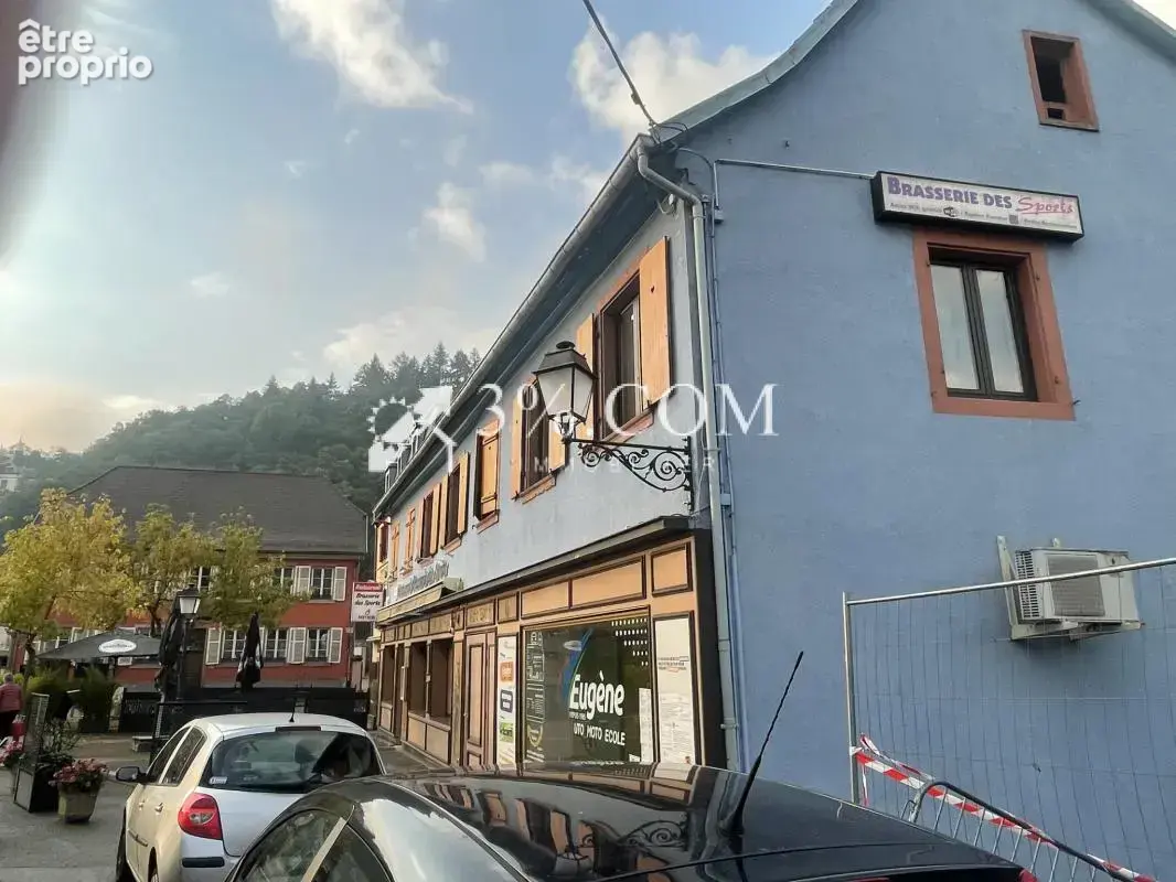 IMMEUBLE DE RAPPORT  Commerces et 3 appartements - photo 4