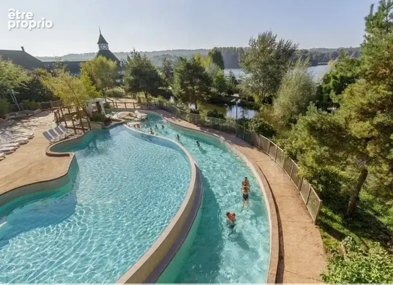 INVESTISSEMENT LOCATIF  CHAMOUILLE  Résidence de tourisme Center Parcs Le Lac d'Ailette - 7.55% de rentabilité - photo 6