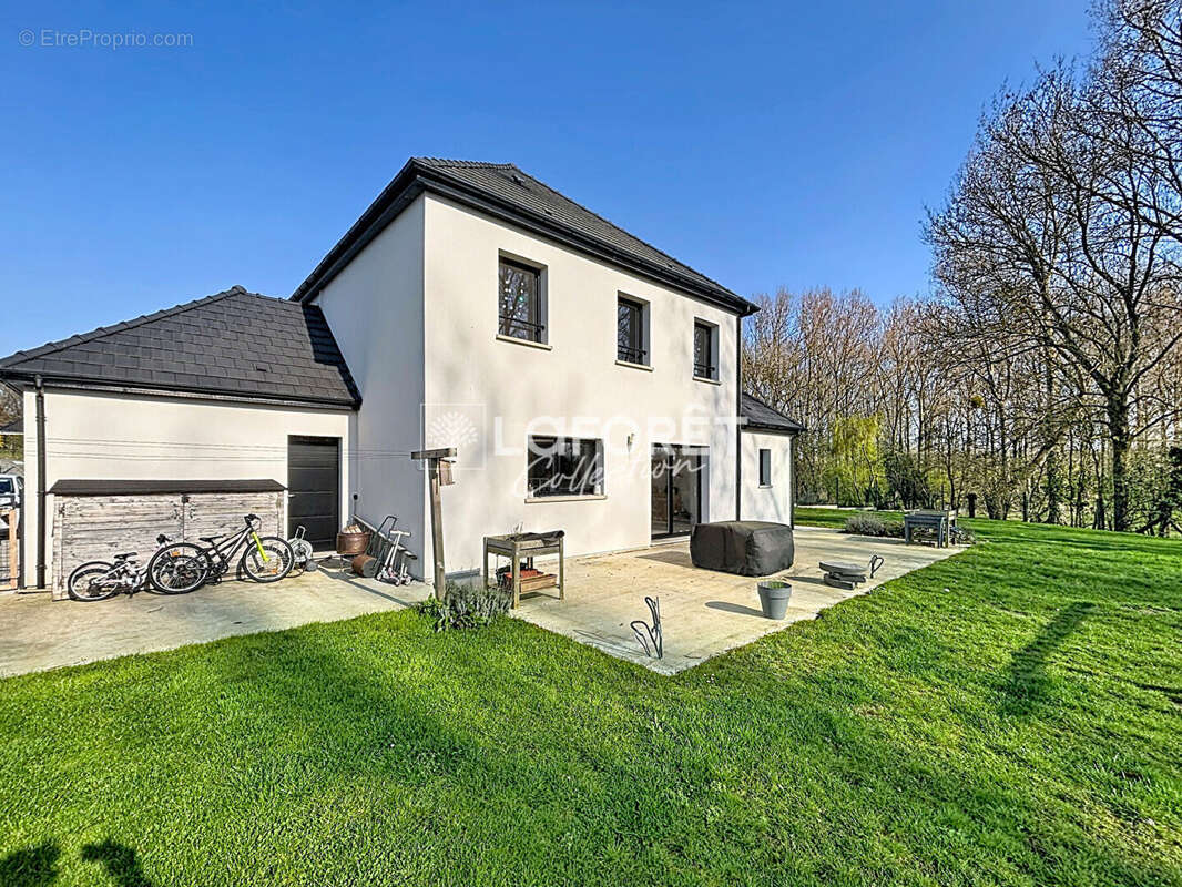 Maison moderne 7 pièce(s) 150 m2 - photo 12