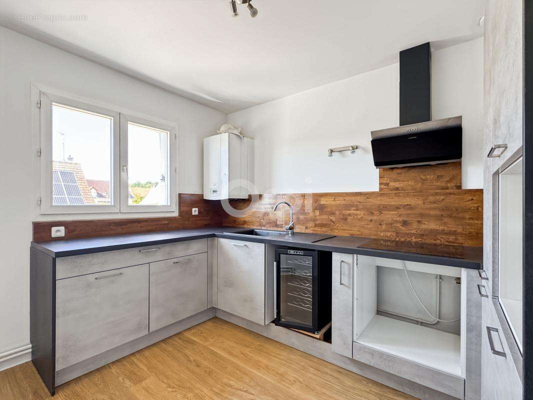 EVREUX - Maison familiale en triplex - 3 chambres, garage et jardin - photo 6