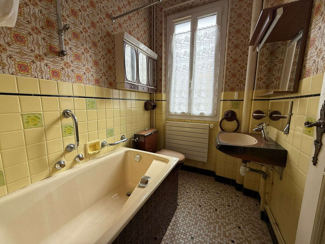 Maison de ville en plein centre ville proche gare - photo 10