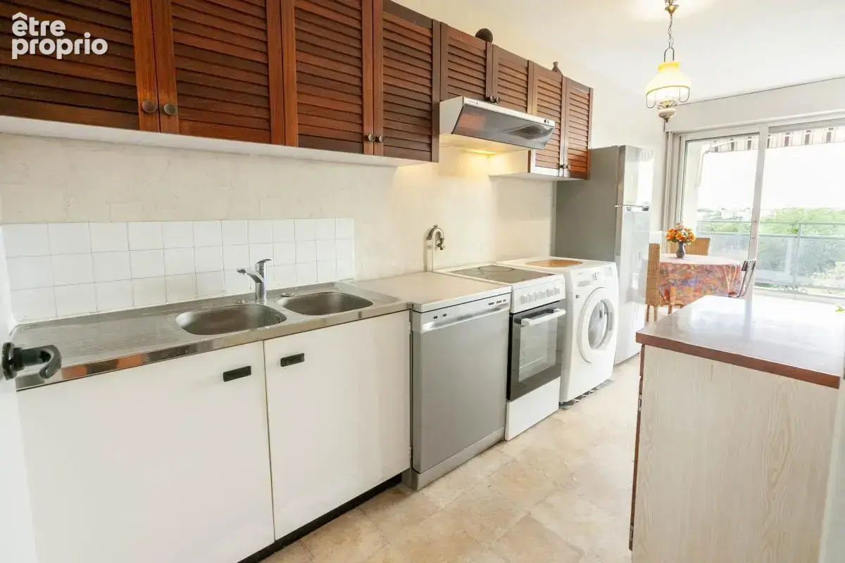 Appartement T3 72m² avec balcon plein sud - Box en sous-sol - photo 9