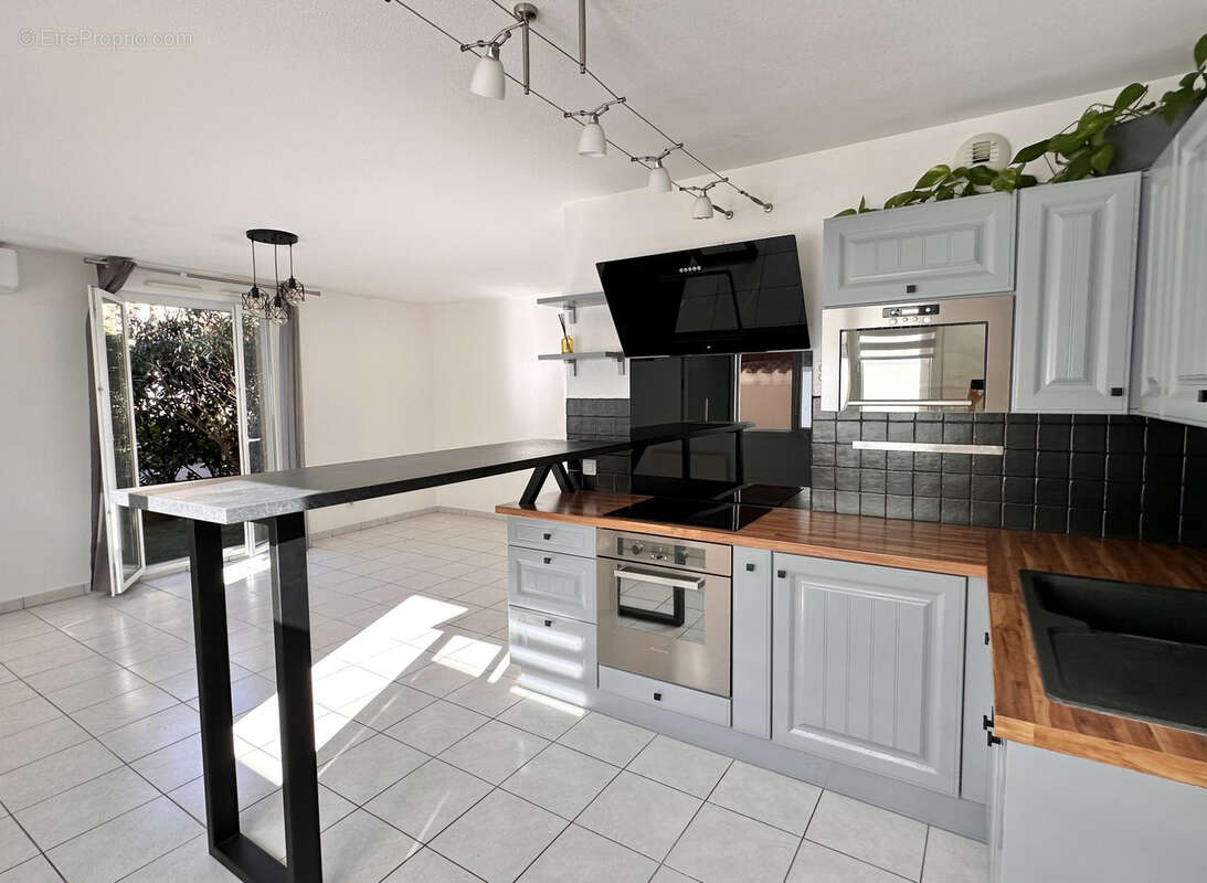 Appartement à GREZIEU-LA-VARENNE