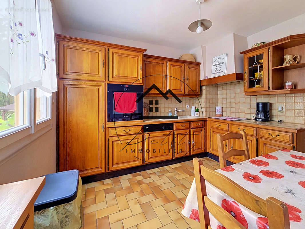 Maison familiale de 107 m2 avec 4 chambres et sous-sol total - photo 5