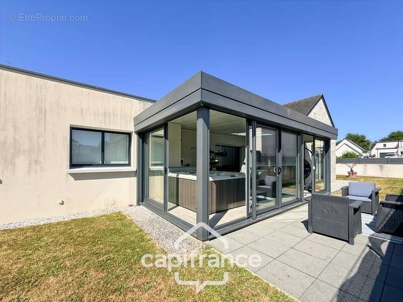 Maison contemporaine de plain-pied de 160 m² – 4 chambres – Véranda de 27 m² avec spa – Double garage – Carport – Noyal-Pontivy - photo 39