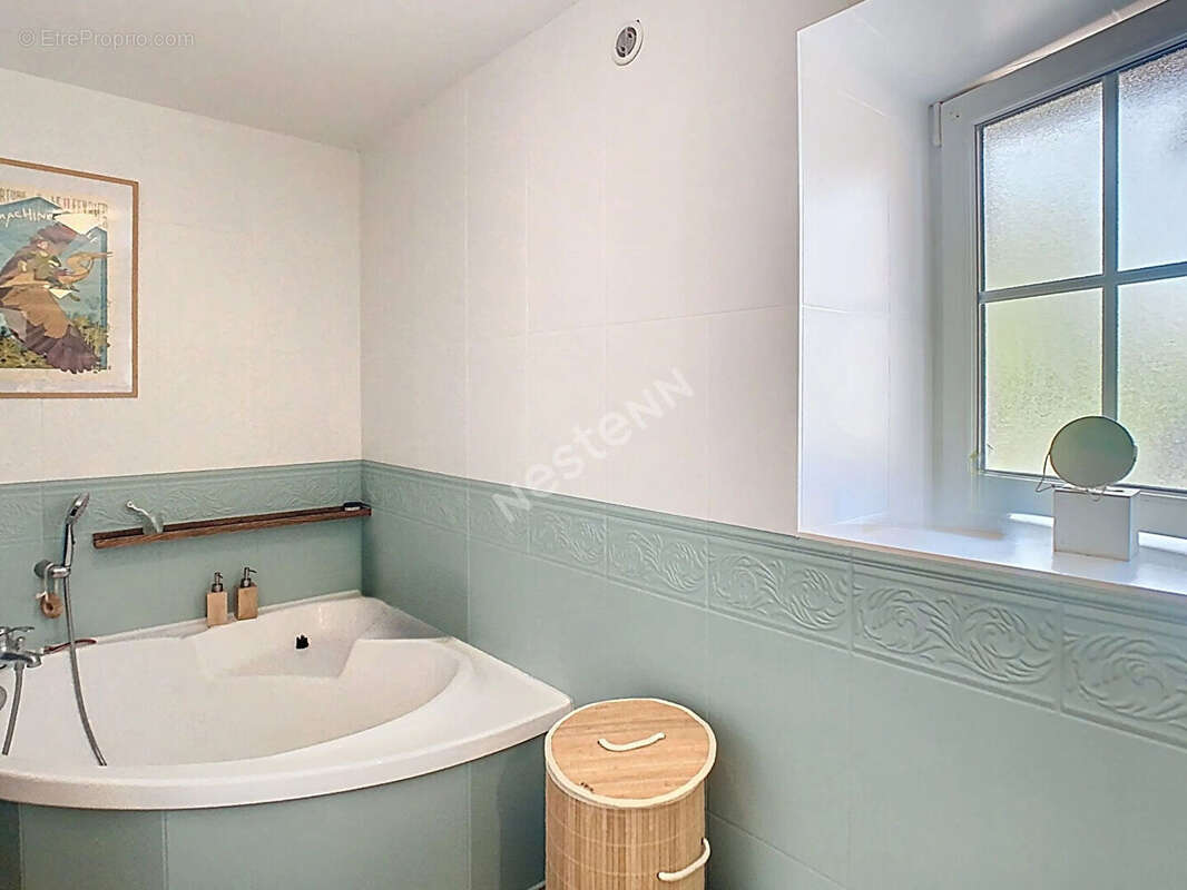 Venez découvrir cette magnifique maison en pierres apparentes, nichée dans un écrin de verdure, à seulement 5 km de l'axe Nantes - photo 9