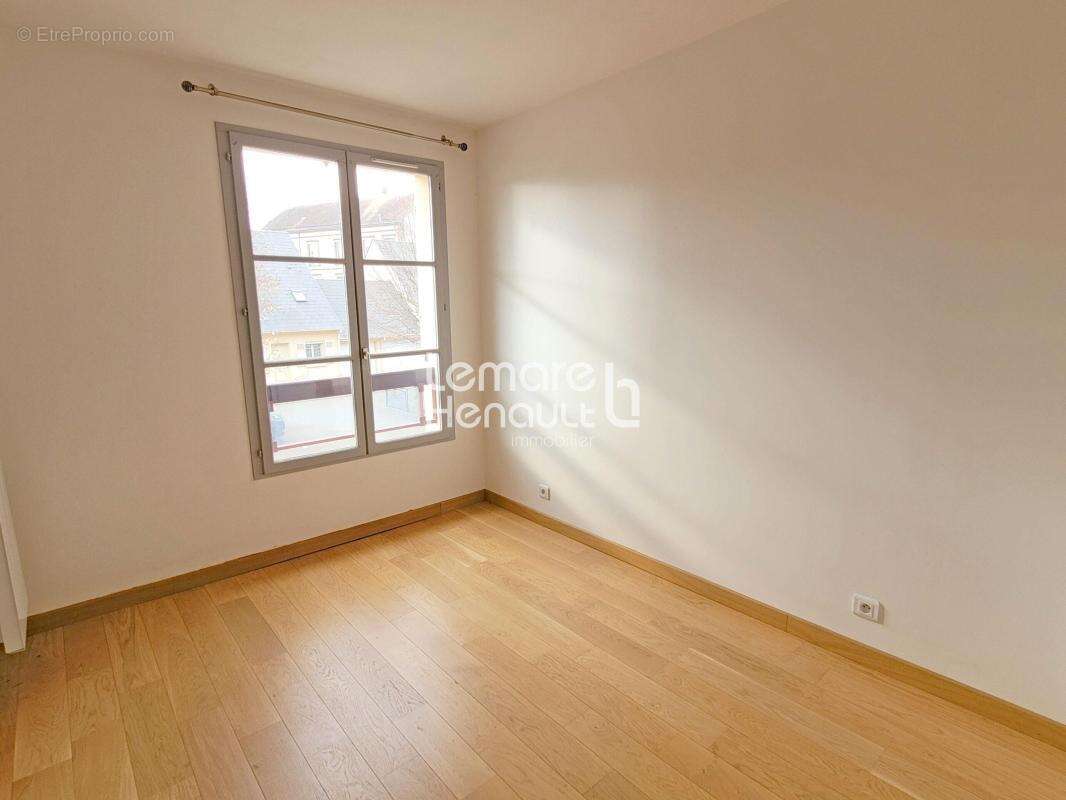 Appartement F3 de 58 m² en bon état avec parking - photo 5