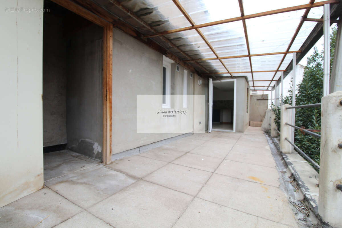 ENSEMBLE IMMOBILER : T4 ; T2 local commercial et grange - photo 7