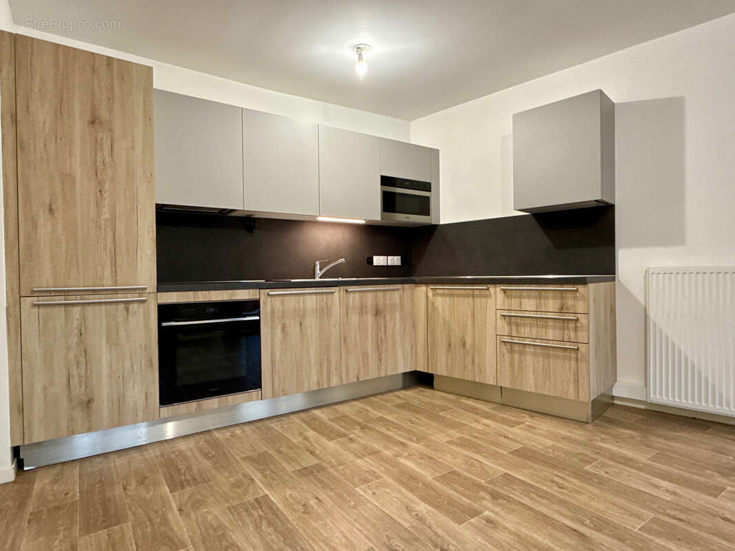 Superbe appartement 4 pièces récent avec un balcon sur parc , futur métro l16 - photo 3